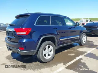 2012 Jeep Grand Cherokee Laredo with VIN 1C4RJFAG0CC160255, listed as a IAAI auction lot 41967809 with 127,702 mi miles. Bid and sale history available at carsss.com. Image 4.
