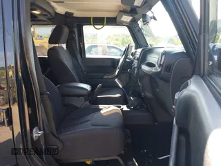 2013 Jeep Wrangler Unlimited Sport z VIN 1C4HJWDG9DL510121, wystawiony jako IAAI lot #42389944 z przebiegiem 84 390 mil mil oraz . Historia ofert i sprzedaży dostępna na DreamBid. Obrazek 5.