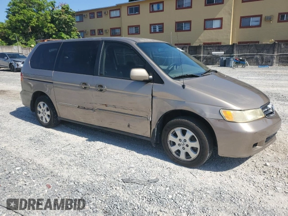 2004 Honda Odyssey EX-RES z VIN 5FNRL18814B125773, wystawiony jako Copart lot #58205565 z przebiegiem 250 732 mil mil oraz Szkoda całkowita • Salvage title. Historia ofert i sprzedaży dostępna na DreamBid. Obrazek 4.