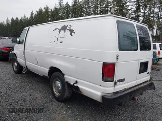 2004 Ford Econoline Cargo with VIN 1FTSS34L84HA56056, listed as a IAAI auction lot 41235862 with 215,095 mi miles and . Bid and sale history available at DreamBid. Image 3.