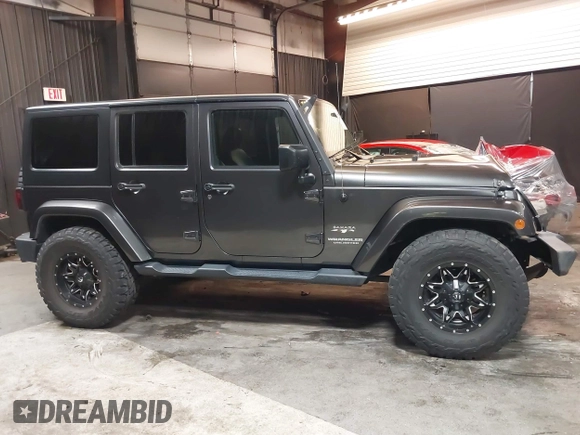 2017 Jeep Wrangler Unlimited Sahara z VIN 1C4BJWEG5HL746971, wystawiony jako IAAI lot #41959241 z przebiegiem 47 458 mil mil oraz . Historia ofert i sprzedaży dostępna na DreamBid. Obrazek 14.