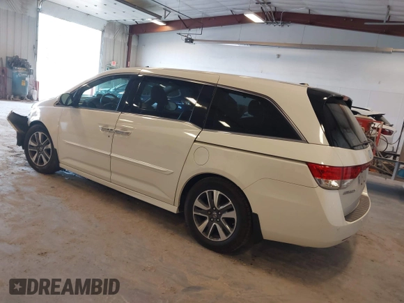 2015 Honda Odyssey Touring Elite with VIN 5FNRL5H97FB060060, listed as a IAAI auction lot 41829864 with Not Provided miles and . Bid and sale history available at DreamBid. Image 3.