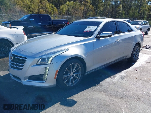 2017 Cadillac CTS Luxury RWD with VIN 1G6AR5SS4H0186842, listed as a IAAI auction lot 40931575 with 166,377 mi miles and . Bid and sale history available at DreamBid. Image 2.