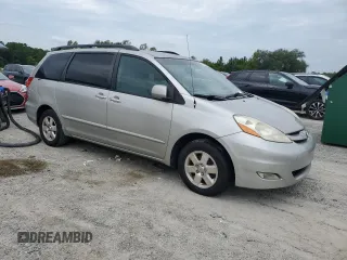 2012 Toyota Sienna XLE AAS with VIN 5TDYK3DC6CS275537, listed as a Copart auction lot 66040605 with 135,148 mi miles and Clean title. Bid and sale history available at DreamBid. Image 4.