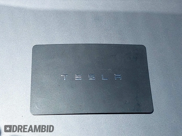 2021 Tesla Model Y Standard Range z VIN 5YJYGDED4MF121963, wystawiony jako IAAI lot #41490477 z przebiegiem 41 941 mil mil oraz . Historia ofert i sprzedaży dostępna na DreamBid. Obrazek 11.