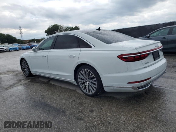 2019 Audi A8 z VIN WAU8DAF88KN004066, wystawiony jako Copart lot #56928395 z przebiegiem 93 157 mil mil oraz Czysty tytuł • Clean title. Historia ofert i sprzedaży dostępna na DreamBid. Obrazek 2.
