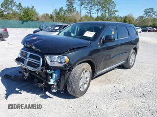 2013 Dodge Durango SXT with VIN 1C4RDJAG2DC617983, listed as a IAAI auction lot 41805992 with 210,560 mi miles and . Bid and sale history available at carsss.com. Image 2.