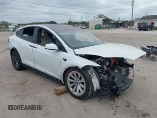 2022 Tesla Model X with VIN 7SAXCDE55NF360393, listed as a IAAI auction lot 41544572 with Not Provided miles and . Bid and sale history available at DreamBid. Image 1.