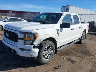 2023 Ford F-150 XL with VIN 1FTFW1E5XPKE92229, listed as a IAAI auction lot 41686774 with 58,008 mi miles. Bid and sale history available at carsss.com. Image 2.