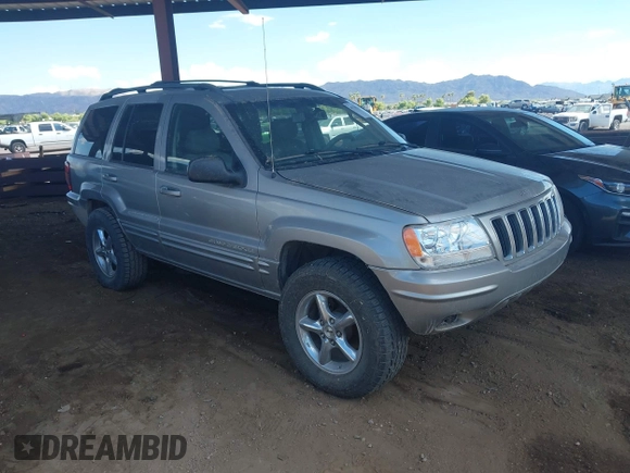 2002 Jeep Grand Cherokee Limited with VIN 1J8GW58J62C165942, listed as a IAAI auction lot 42739339 with 220,677 mi miles and . Bid and sale history available at DreamBid. Image 1.