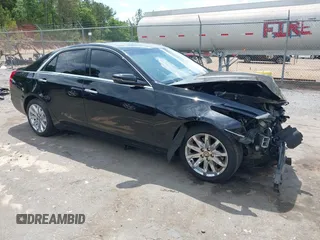 2016 Cadillac CTS AWD with VIN 1G6AW5SX7G0129019, listed as a IAAI auction lot 42148335 with 86,023 mi miles and . Bid and sale history available at DreamBid. Image 1.