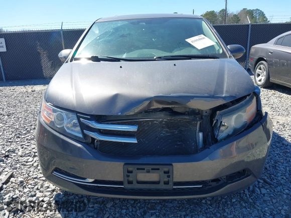 2014 Honda Odyssey EX-L with VIN 5FNRL5H61EB014695, listed as a IAAI auction lot 41694860 with 261,265 mi miles and . Bid and sale history available at DreamBid. Image 12.