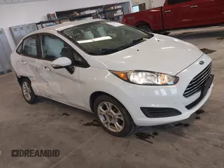 2016 Ford Fiesta SE z VIN 3FADP4BJ4GM188559, wystawiony jako IAAI lot #42219777 z przebiegiem 57 251 mil mil oraz . Historia ofert i sprzedaży dostępna na DreamBid. Obrazek 1.