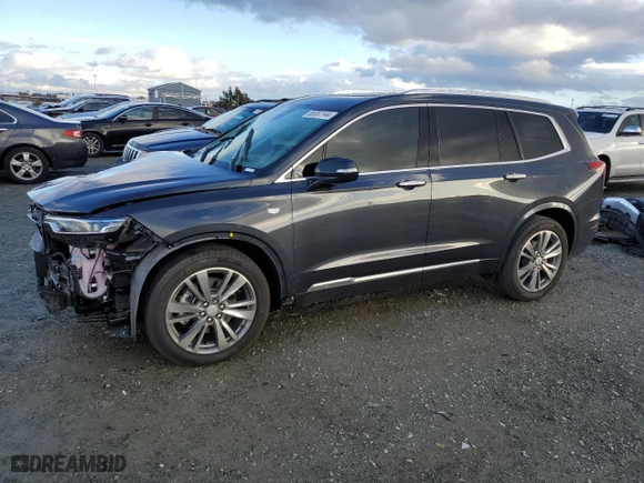 2021 Cadillac XT6 Premium Luxury with VIN 1GYKPERS3MZ150928, listed as a Copart auction lot 86551144 with 12,311 mi miles and Salvage Title. Bid and sale history available at carsss.com. Image 1.