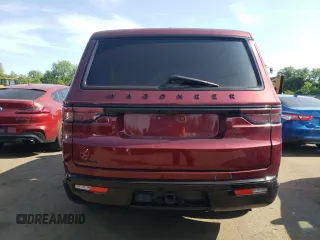 2023 Jeep Wagoneer Series II Carbide with VIN 1C4SJVBP1PS569158, listed as a Copart auction lot 57888145 with 23,613 mi miles and Salvage title. Bid and sale history available at DreamBid. Image 6.