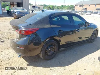 2014 Mazda 3 i SV z VIN JM1BM1T74E1115455, wystawiony jako IAAI lot #42136462 z przebiegiem 97 029 mil mil oraz . Historia ofert i sprzedaży dostępna na DreamBid. Obrazek 4.