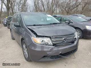 2012 Honda Odyssey EX-L with VIN 5FNRL5H60CB081866, listed as a IAAI auction lot 41835701 with 151,236 mi miles. Bid and sale history available at carsss.com. Image 1.
