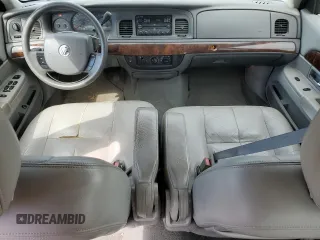2005 Mercury Grand Marquis GS z VIN 2MEFM74W25X624329, wystawiony jako Copart lot #50945805 z przebiegiem 140 717 mil mil oraz Tytuł czysty. Historia ofert i sprzedaży dostępna na DreamBid. Obrazek 8.