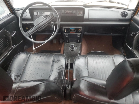 1984 FIAT 124 Spider z VIN SUP115CC602154116, wystawiony jako Copart lot #82469494 z przebiegiem 3 613 mil mil oraz Szkoda całkowita • Salvage title. Historia ofert i sprzedaży dostępna na DreamBid. Obrazek 8.