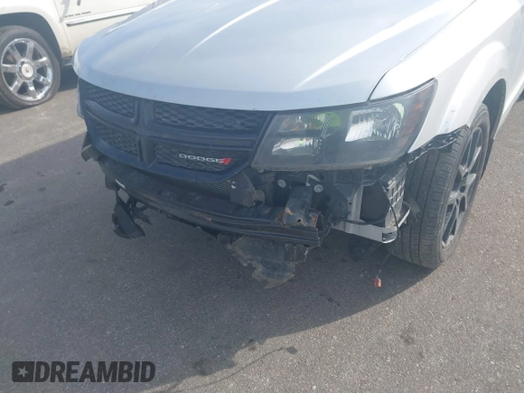 2013 Dodge Journey SXT with VIN 3C4PDDBG9DT680798, listed as a IAAI auction lot 41655958 with 140,594 mi miles and . Bid and sale history available at DreamBid. Image 6.