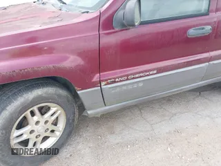 2003 Jeep Grand Cherokee Laredo with VIN 1J4GX48S83C576892, listed as a IAAI auction lot 42082865 with 212,157 mi miles. Bid and sale history available at carsss.com. Image 6.
