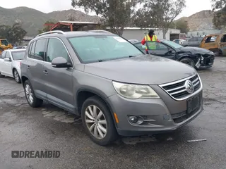 2011 Volkswagen Tiguan SE with VIN WVGAV7AX4BW515069, listed as a IAAI auction lot 41813579 with 100,644 mi miles and . Bid and sale history available at DreamBid. Image 1.
