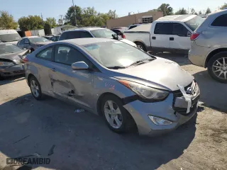 2013 Hyundai Elantra Coupe GS PZEV with VIN KMHDH6AE3DU000530, listed as a Copart auction lot 74739804 with 124,673 mi miles and Salvage Title. Bid and sale history available at carsss.com. Image 4.