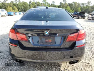 2013 BMW 5 Series 550i xDrive z VIN WBAFU9C59DDY72859, wystawiony jako Copart lot #56211465 z przebiegiem 98 620 mil mil oraz Szkoda całkowita • Salvage title. Historia ofert i sprzedaży dostępna na DreamBid. Obrazek 6.