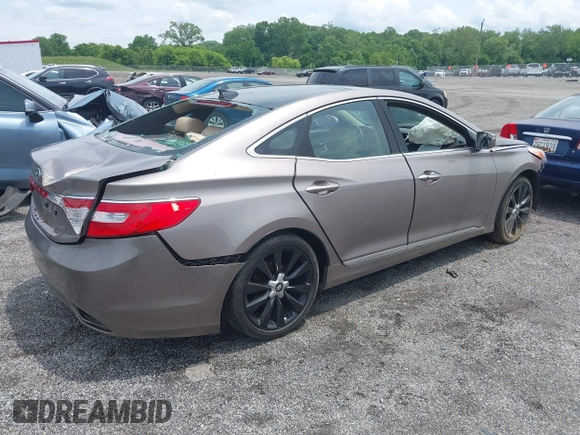 2013 Hyundai Azera with VIN KMHFH4JG2DA263558, listed as a IAAI auction lot 42434288 with 147,282 mi miles and . Bid and sale history available at DreamBid. Image 4.