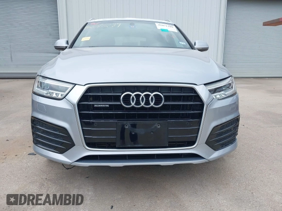 2018 Audi Q3 Premium Plus z VIN WA1JCCFS8JR023281, wystawiony jako IAAI lot #42071289 z przebiegiem 71 335 mil mil oraz . Historia ofert i sprzedaży dostępna na DreamBid. Obrazek 13.