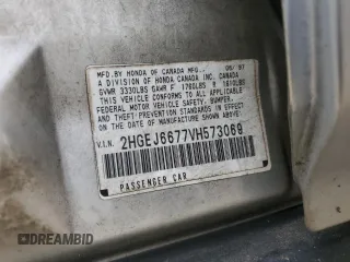 1997 Honda Civic LX z VIN 2HGEJ6677VH573069, wystawiony jako Copart lot #59739065 z przebiegiem 287 987 mil mil oraz Szkoda całkowita • Salvage title. Historia ofert i sprzedaży dostępna na DreamBid. Obrazek 13.