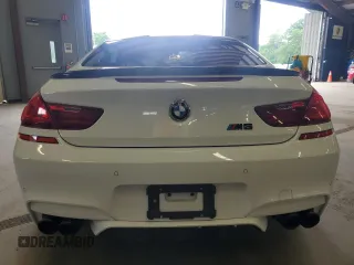 2014 BMW M6 z VIN WBSLX9C58ED160480, wystawiony jako Copart lot #64464985 z przebiegiem 58 514 mil mil oraz Czysty tytuł • Clean title. Historia ofert i sprzedaży dostępna na DreamBid. Obrazek 6.