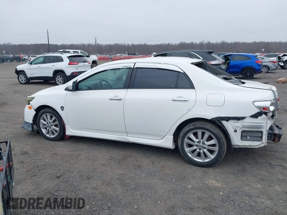 2011 Toyota Corolla L with VIN 2T1BU4EE8BC681039, listed as a IAAI auction lot 41798321 with 195,583 mi miles. Bid and sale history available at carsss.com. Image 14.