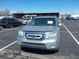 2011 Honda Pilot EX-L with VIN 5FNYF3H6XBB055684, listed as a IAAI auction lot 41820076 with 227,655 mi miles and . Bid and sale history available at DreamBid. Image 12.