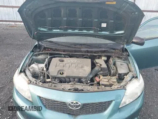2009 Toyota Corolla with VIN JTDBL40E099063708, listed as a IAAI auction lot 42085584 with 110,075 mi miles. Bid and sale history available at carsss.com. Image 10.
