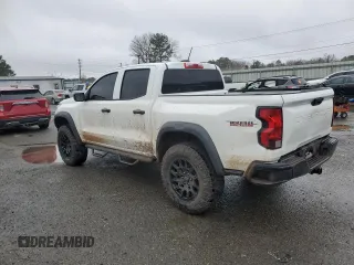 2023 Chevrolet Colorado 4WD Trail Boss with VIN 1GCPTEEK5P1255504, listed as a Copart auction lot 87727235 with 23,817 mi miles and Salvage Title. Bid and sale history available at carsss.com. Image 2.