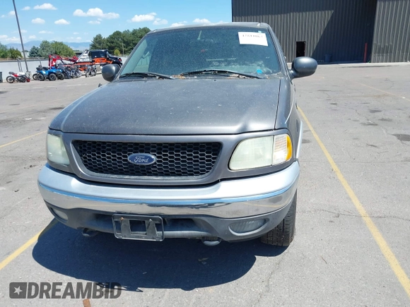 2003 Ford F-150 XLT with VIN 1FTRW08L63KD17116, listed as a IAAI auction lot 42811062 with Not provided miles and . Bid and sale history available at DreamBid. Image 12.