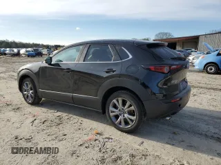 2021 Mazda CX-30 Select with VIN 3MVDMBBL1MM253743, listed as a Copart auction lot 48373625 with 59,466 mi miles and Salvage Title. Bid and sale history available at carsss.com. Image 2.