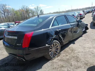 2014 Cadillac CTS Luxury RWD with VIN 1G6AR5SX4E0165254, listed as a IAAI auction lot 41938674 with 54,470 mi miles. Bid and sale history available at carsss.com. Image 4.