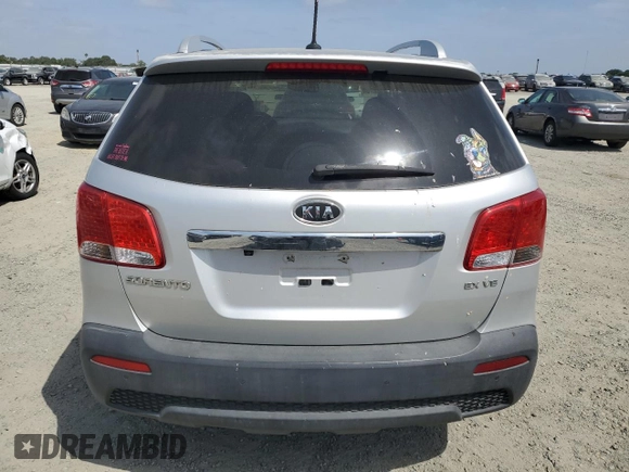2013 Kia Sorento EX with VIN 5XYKUDA23DG411929, listed as a Copart auction lot 54327335 with 141,926 mi miles and Clean Title. Bid and sale history available at carsss.com. Image 6.