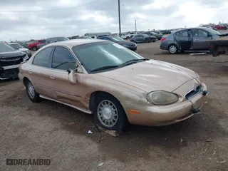 1997 Mercury Sable LS with VIN 1MELM53S8VA602057, listed as a IAAI auction lot 41468005 with 71,203 mi miles. Bid and sale history available at carsss.com. Image 1.