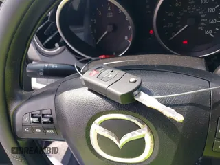 2010 Mazda 3 i Sport with VIN JM1BL1SFXA1271070, listed as a IAAI auction lot 42148364 with 123,921 mi miles and . Bid and sale history available at DreamBid. Image 11.