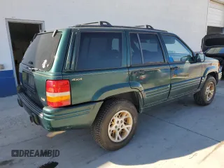 1998 Jeep Grand Cherokee Limited with VIN 1J4GZ78Y1WC124156, listed as a Copart auction lot 77587394 with 176,936 mi miles and Clean Title. Bid and sale history available at carsss.com. Image 3.