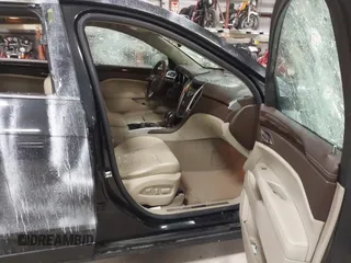 2011 Cadillac SRX Performance Collection with VIN 3GYFNEEY3BS560107, listed as a IAAI auction lot 42017220 with 243,740 mi miles and . Bid and sale history available at carsss.com. Image 5.
