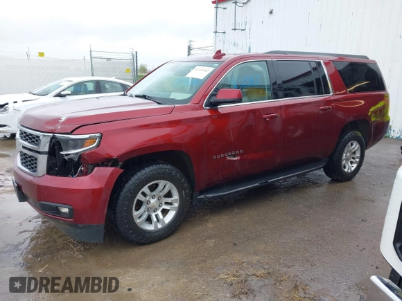 2020 Chevrolet Suburban LT with VIN 1GNSKHKC9LR233603, listed as a IAAI auction lot 41311582 with 104,754 mi miles. Bid and sale history available at carsss.com. Image 2.