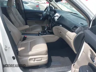 2019 Honda Ridgeline RTL-E with VIN 5FPYK3F77KB021667, listed as a IAAI auction lot 42115019 with 87,221 mi miles and . Bid and sale history available at DreamBid. Image 5.