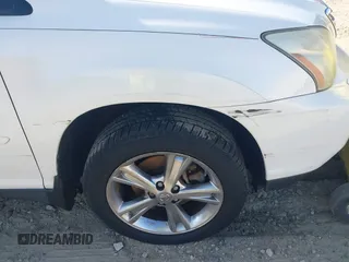 2007 Lexus RX 400h z VIN JTJGW31U472002782, wystawiony jako IAAI lot #41763035 z przebiegiem 228 650 mil mil oraz . Historia ofert i sprzedaży dostępna na DreamBid. Obrazek 12.