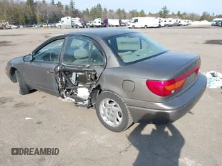 2000 Saturn SL z VIN 1G8ZK5275YZ244530, wystawiony jako IAAI lot #41784896 z przebiegiem 50 332 mil mil oraz . Historia ofert i sprzedaży dostępna na DreamBid. Obrazek 3.