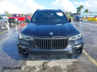 2021 BMW X7 M50i with VIN 5UXCX6C06M9H34992, listed as a IAAI auction lot 41513197 with 22,029 mi miles. Bid and sale history available at carsss.com. Image 6.