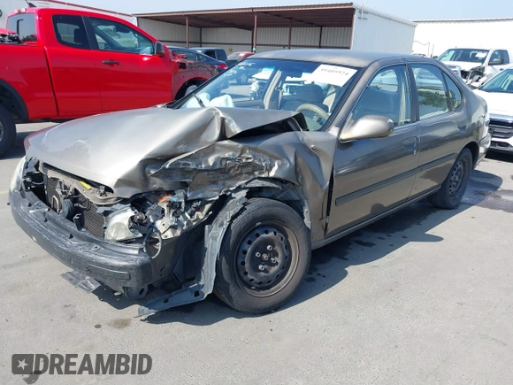 2000 Nissan Altima XE with VIN 1N4DL01D9YC218013, listed as a IAAI auction lot 39405924 with 173,861 mi miles and . Bid and sale history available at DreamBid. Image 6.